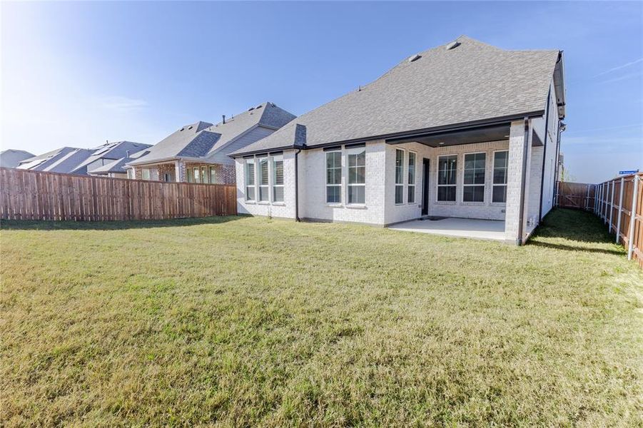 Exterior details and patio area of a home in , Aubrey (Image 25).