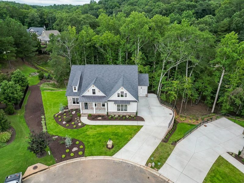 Front exterior of a new home in , Cumming, GA, highlighting curb appeal (Image 26).