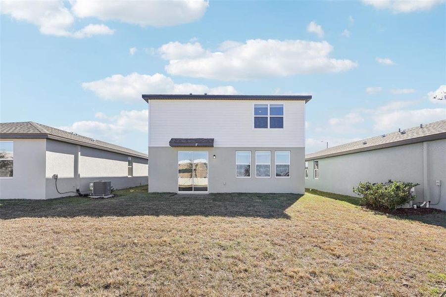 Exterior details and patio area of a home in , Poinciana (Image 4).