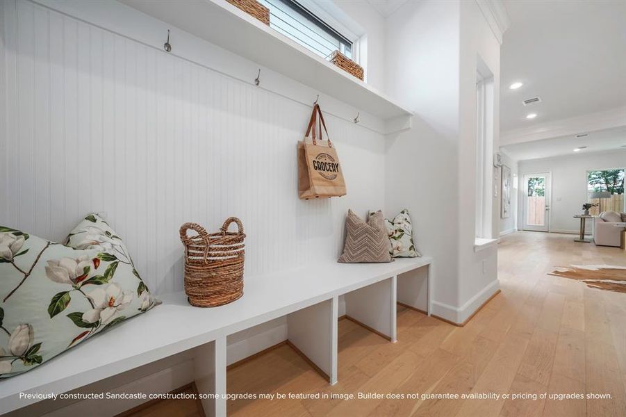 Organized Elegance: Elevate your entryway with a meticulously designed built-in bench and cubbies, blending form with function in your home’s greeting space.