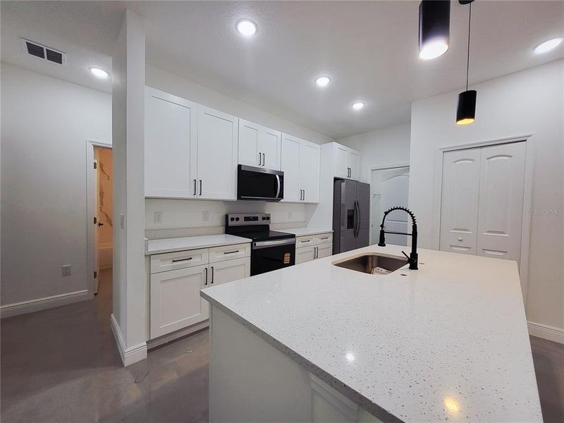 Furnished interior view inside a new home in , Palm Bay (Image 3). Furnished interior view inside a new home in , Palm Bay (Image 3).