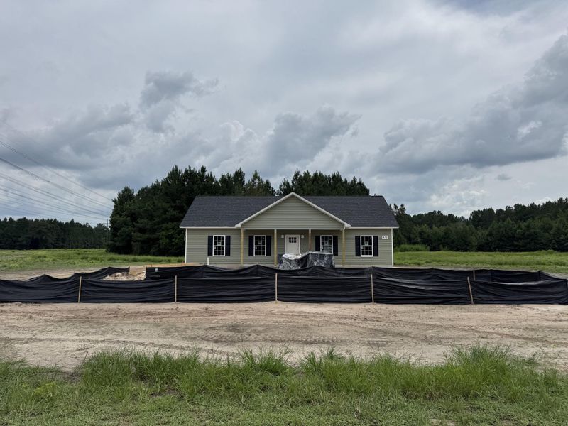 Front exterior of a new home in , St. George, SC, highlighting curb appeal (Image 13).