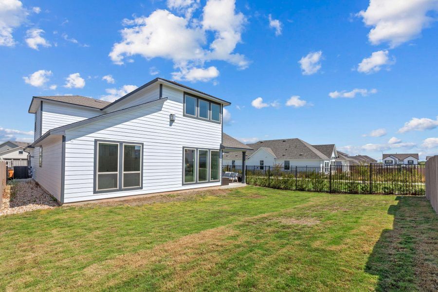 Exterior details and patio area of a home in , Austin (Image 2). Exterior details and patio area of a home in , Austin (Image 2).