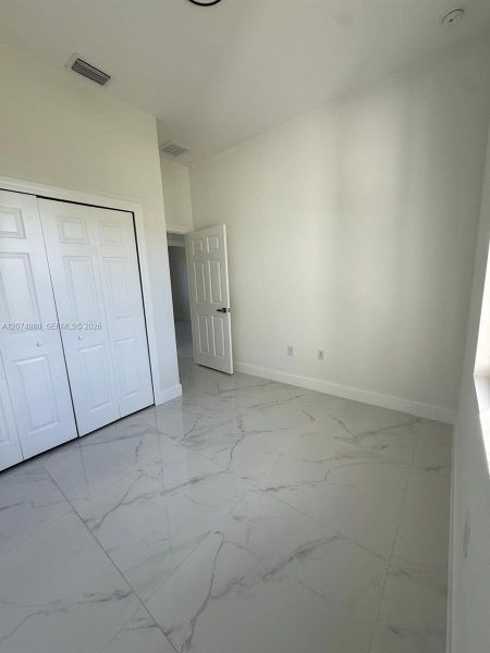 Spacious, unfurnished interior of a new home in , Lehigh Acres (Image 13).