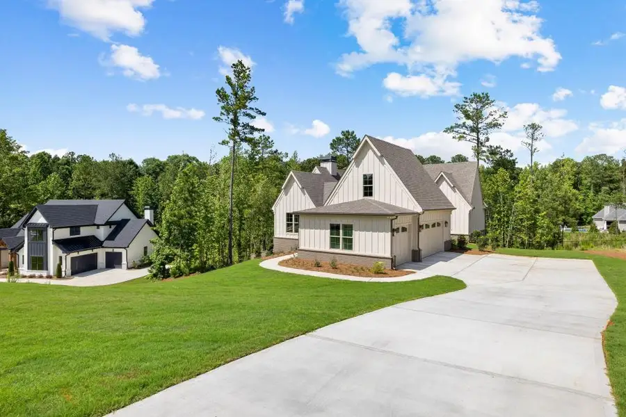 Front exterior of a new home in , Newnan, GA, highlighting curb appeal (Image 22).