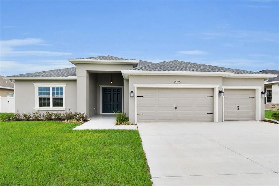 Front exterior of a new home in , Ocala, FL, highlighting curb appeal (Image 28).