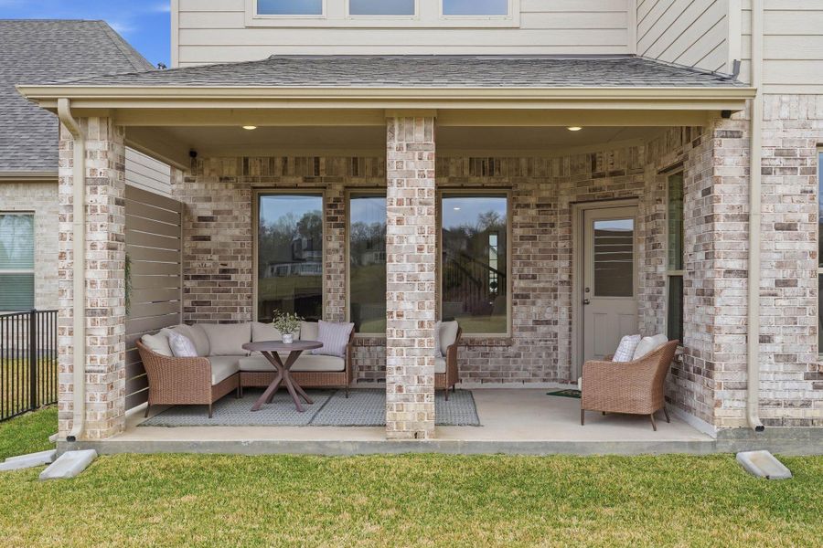 Exterior details and patio area of a home in Waterstone on Lake Conroe, Montgomery (Image 24).
