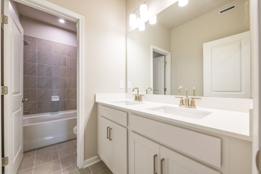 Representative furnished interior of a home built from the Emerson by Beazer Homes in The Paddocks at Doc Hughes, Buford (Image 10).