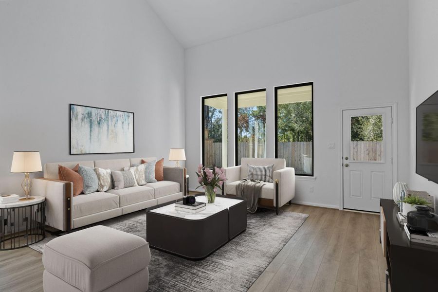 Your family room has ample space to entertain family and friends. This space features beautiful floors, fresh paint, ceiling fan with lighting, and high ceilings. Your family room has ample space to entertain family and friends. This space features beautiful floors, fresh paint, ceiling fan with lighting, and high ceilings.