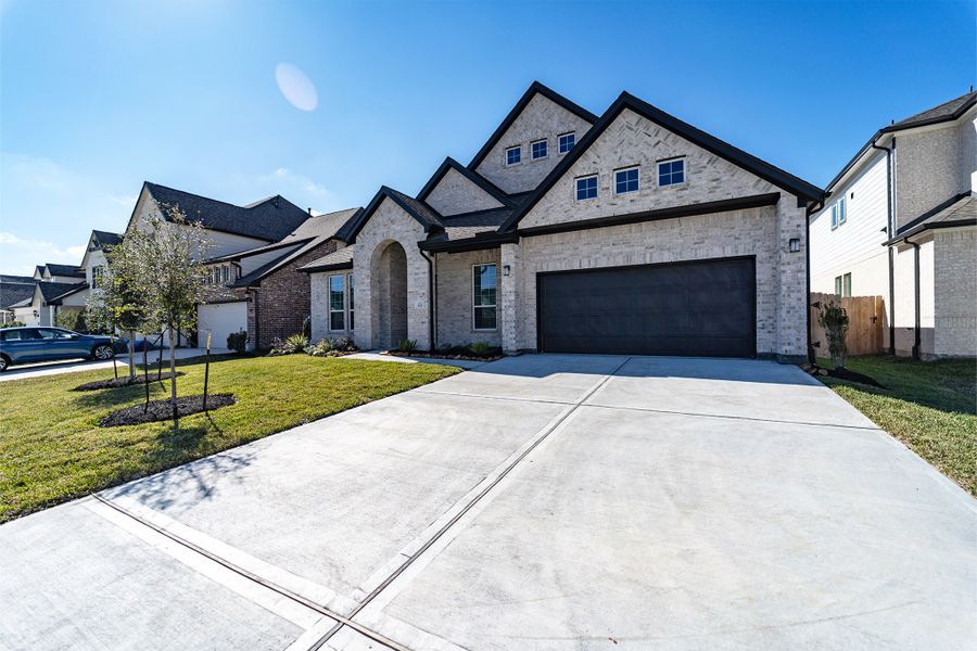 Front exterior of a new home in Westwood, League City, TX, highlighting curb appeal (Image 26).