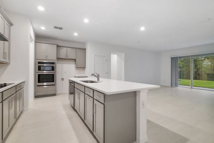 Furnished interior view inside a new home in Trinity Gardens, Deland (Image 8).