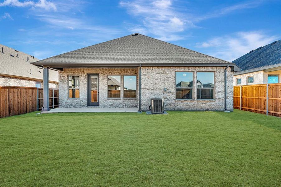 Exterior details and patio area of a home in Creekshaw – Classic, Royse City (Image 3). Exterior details and patio area of a home in Creekshaw – Classic, Royse City (Image 3).