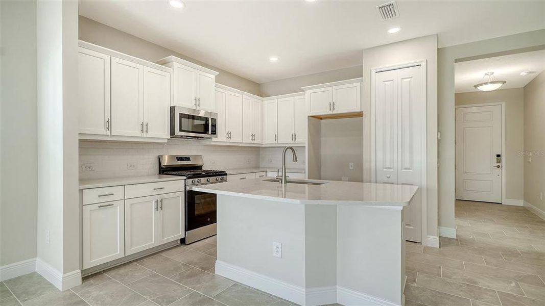Furnished interior view inside a new home in Vicenza Real Estate and Homes for Sale in North Venice, FL - Neal Communities, Nokomis (Image 5).
