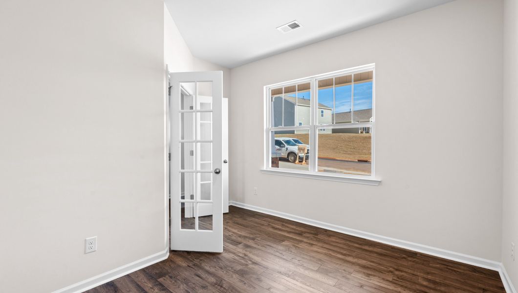 Representative unfurnished interior of a home built from the Biltmore by D.R. Horton in Hunters Ridge, Woodruff (Image 16).