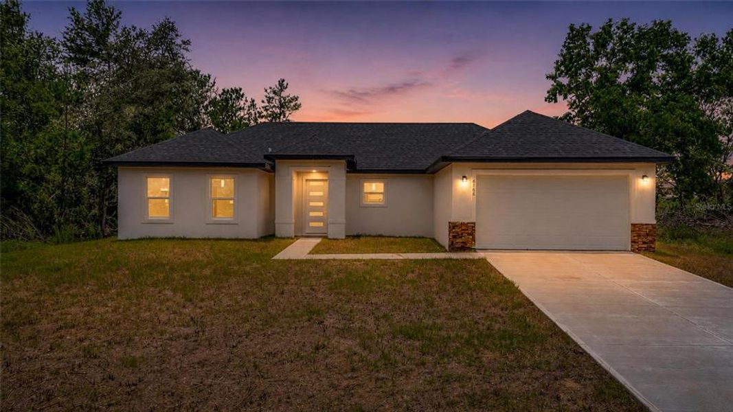Front exterior of a new home in , Ocala, FL, highlighting curb appeal (Image 19).