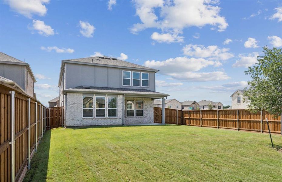 Fenced-in backyard Fenced-in backyard