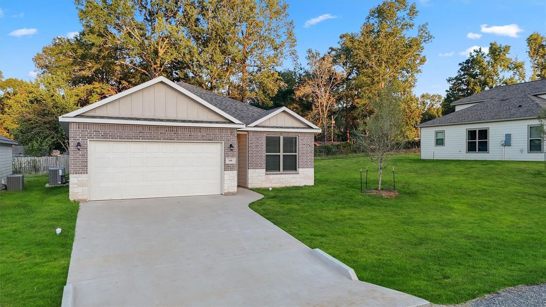 Front exterior of a new home in , Lufkin, TX, highlighting curb appeal (Image 2). Front exterior of a new home in , Lufkin, TX, highlighting curb appeal (Image 2).