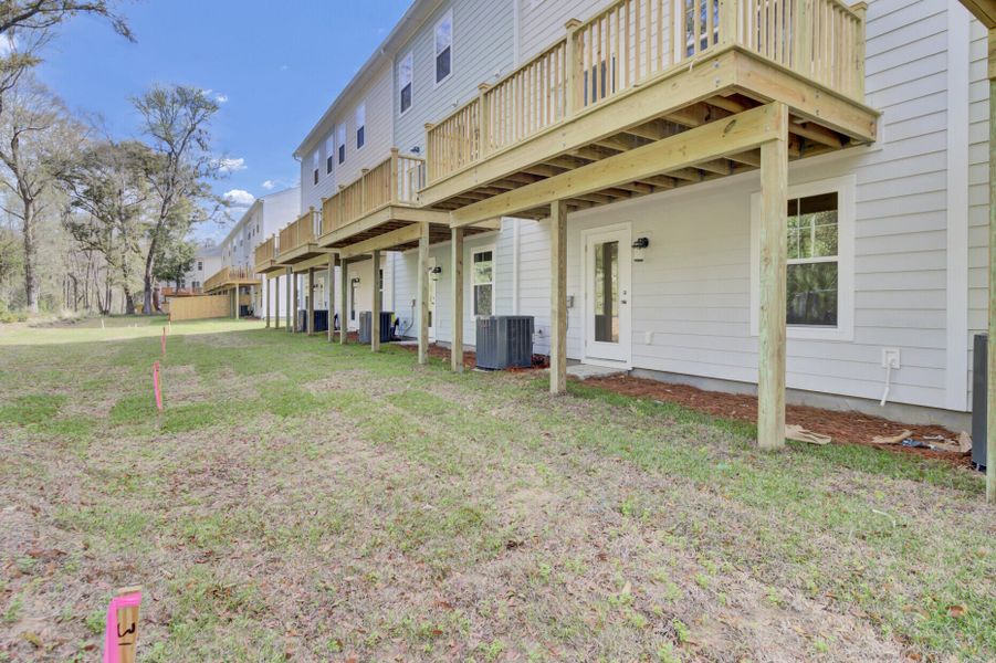 Exterior details and patio area of a home in , Johns Island (Image 30).
