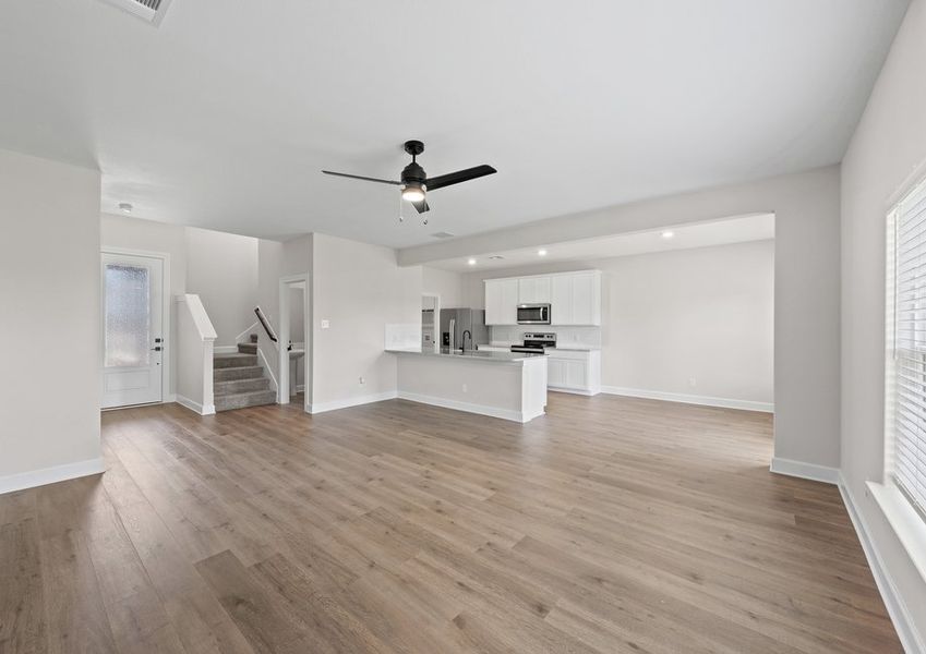 The large family room has plenty of space for large furniture. The large family room has plenty of space for large furniture.