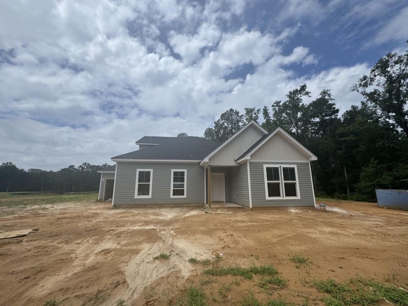 Front exterior of a new home in Central Estates, Summerville, SC, highlighting curb appeal (Image 2).