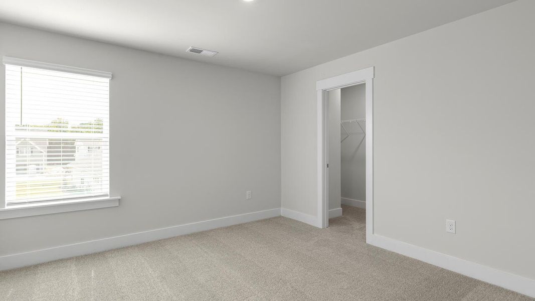 Spacious, unfurnished interior of a new home in Surfside Landing, Hubert (Image 36).