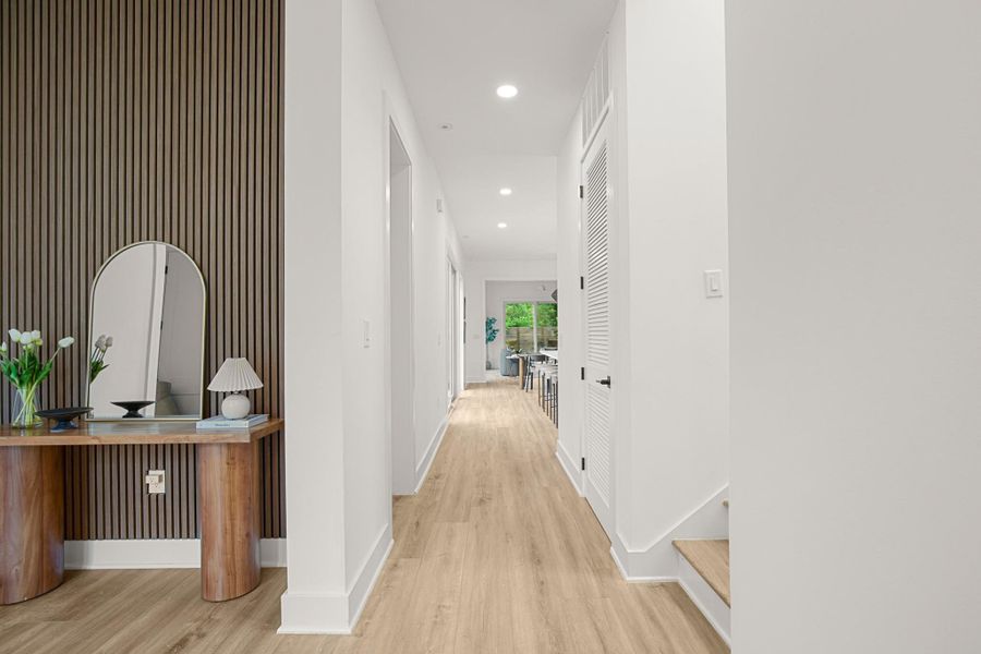 Corridor with recessed lighting and light wood finished floors Corridor with recessed lighting and light wood finished floors