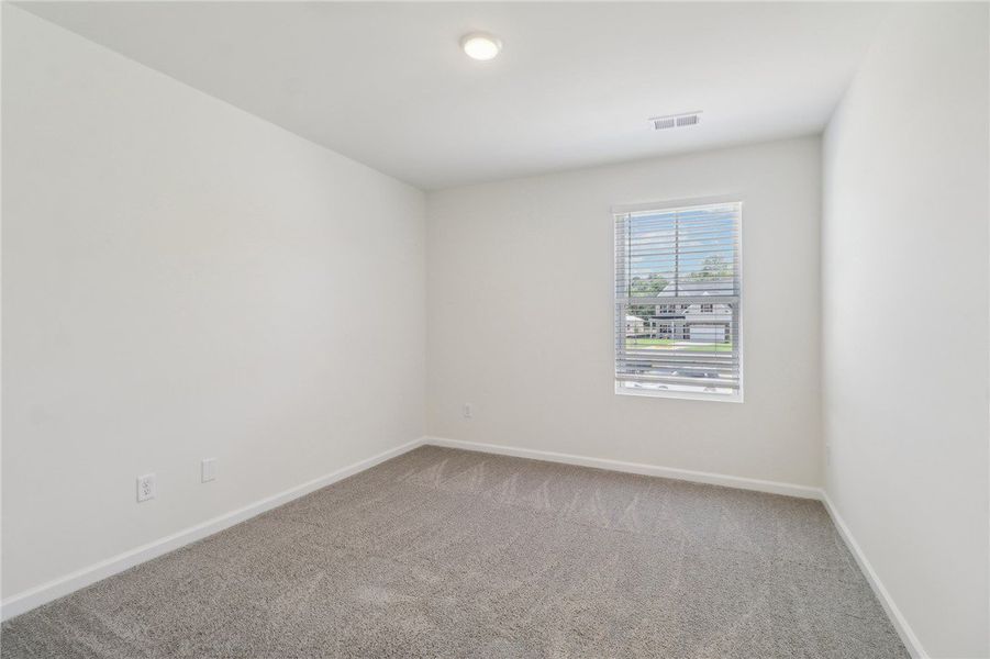 This bright, blank canvas bedroom awaits your pers This bright, blank canvas bedroom awaits your pers