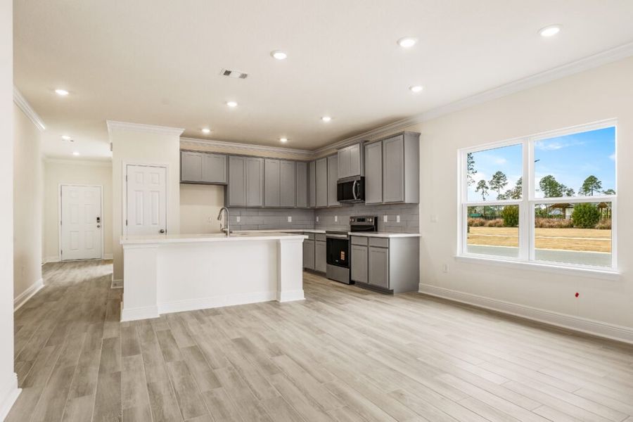 Furnished interior view inside a new home in Natureview, Freeport (Image 12).