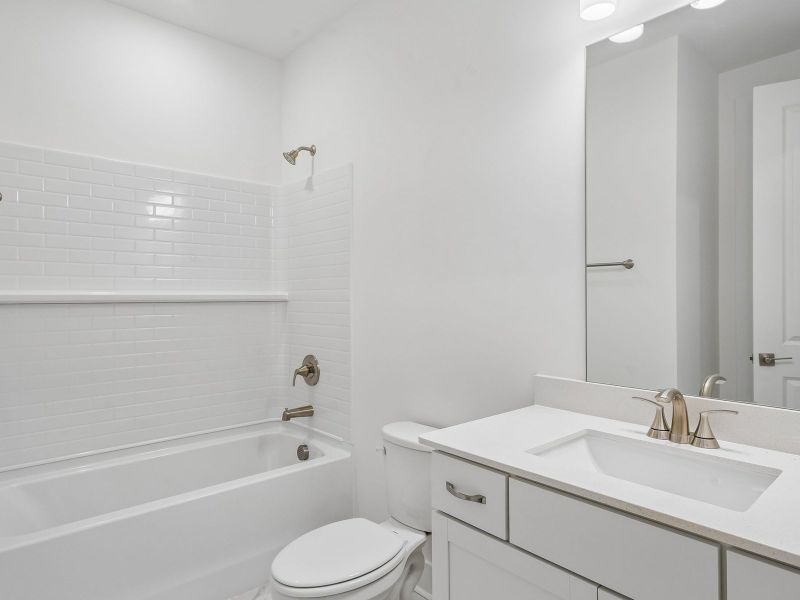 Furnished interior view inside a new home in Station Hill - Estate Series, Franklin (Image 8).