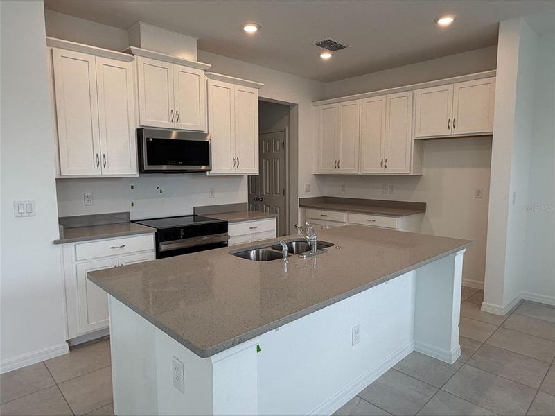 Furnished interior view inside a new home in Beresford Woods, Deland (Image 4).