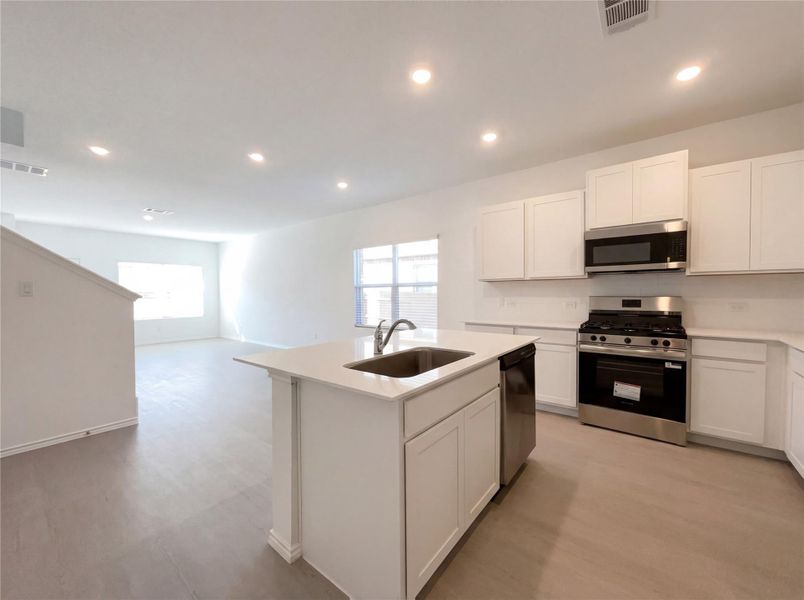 Furnished interior view inside a new home in The Colony, Bastrop (Image 7).