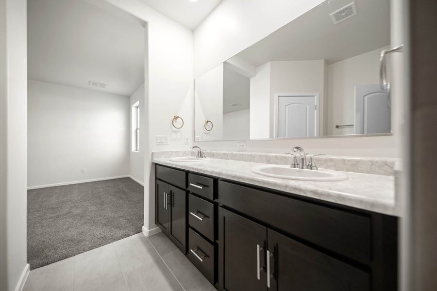 Representative furnished interior of a home built from the Aguirre by Hakes Brothers in Summer Sky North, El Paso (Image 5).