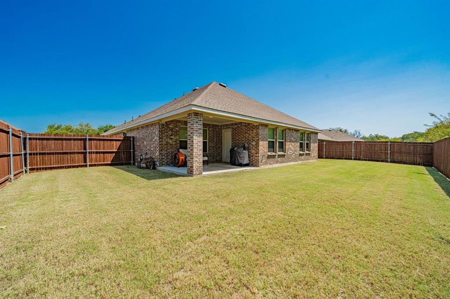 Front exterior of a new home in , Kaufman, TX, highlighting curb appeal (Image 24). Front exterior of a new home in , Kaufman, TX, highlighting curb appeal (Image 24).