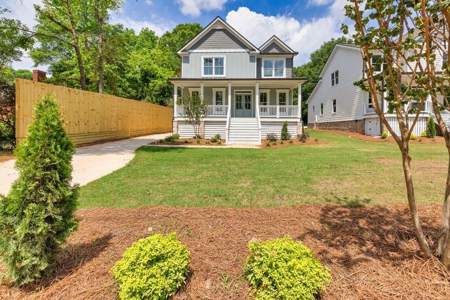 Front exterior of a new home in East Marable Street, Monroe, GA, highlighting curb appeal (Image 1).