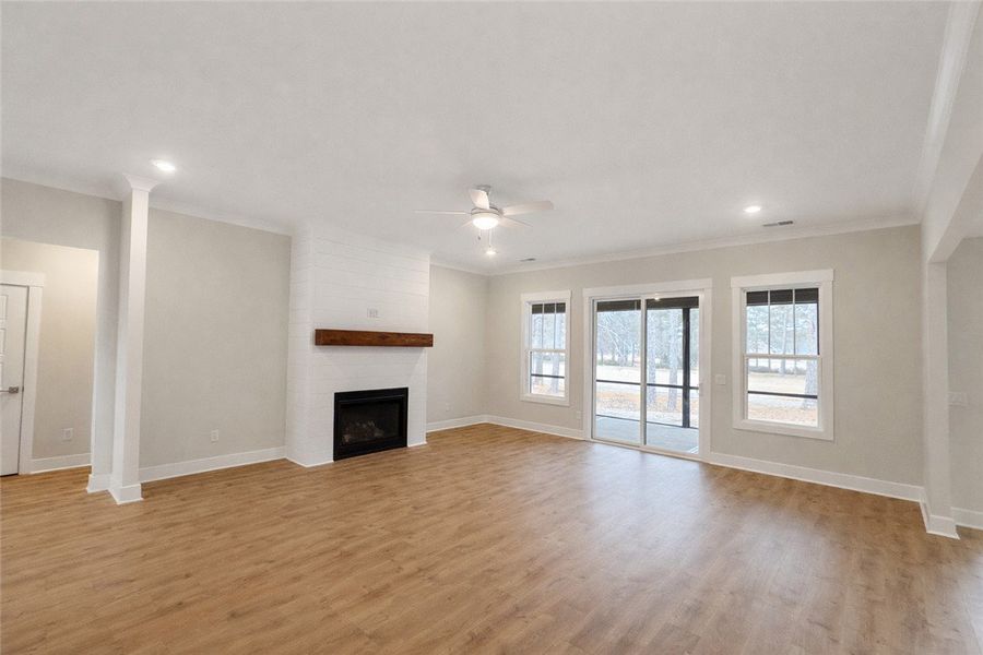 This inviting living space features warm flooring,