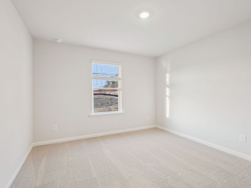 Spacious, unfurnished interior of a new home in Vines at Mill Creek - Estate Series, Braselton (Image 18).