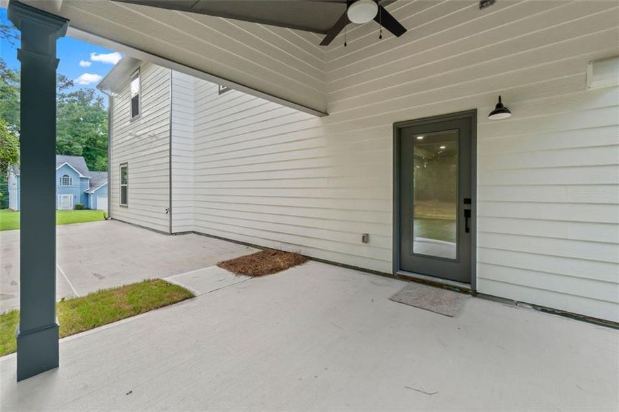 Front exterior of a new home in , Lithonia, GA, highlighting curb appeal (Image 26).