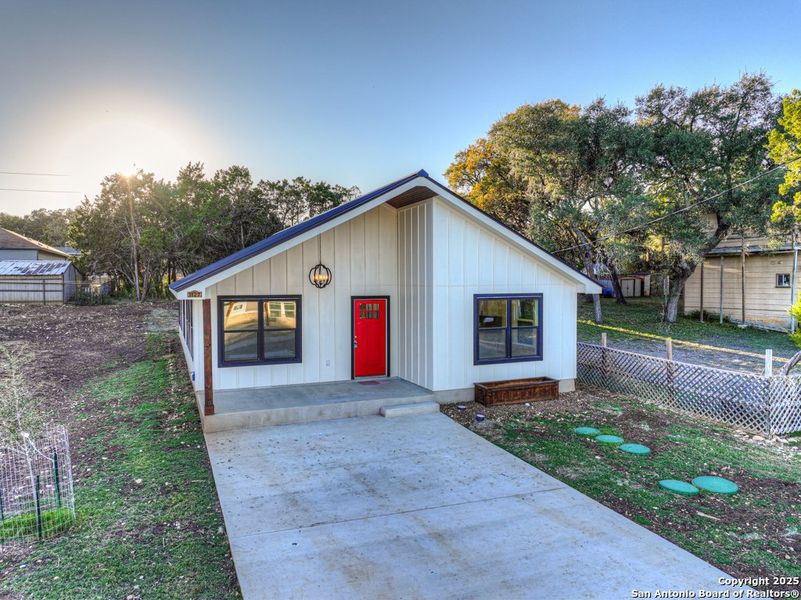 Front exterior of a new home in , Canyon Lake, TX, highlighting curb appeal (Image 2).