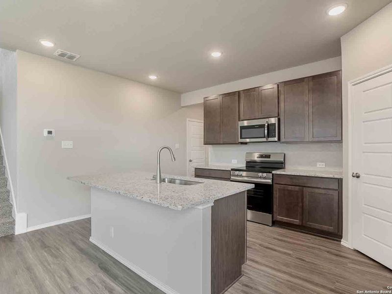 Furnished interior view inside a new home in Hannah Heights, Seguin (Image 6).