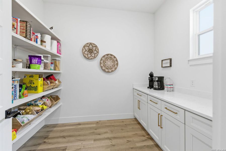 Furnished interior view inside a new home in , Bandera (Image 53).