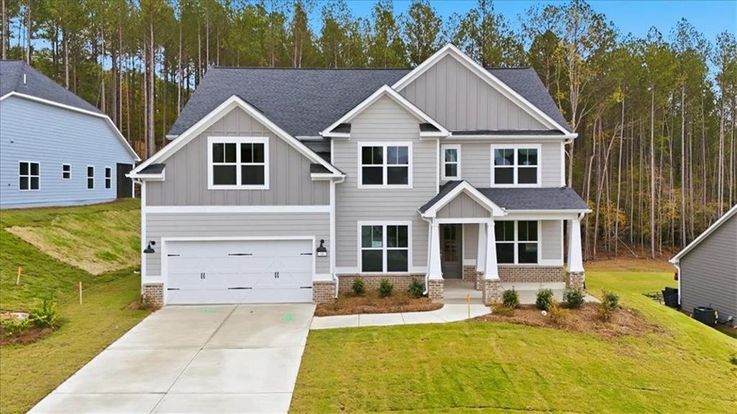 Front exterior of a new home in , Dallas, GA, highlighting curb appeal (Image 20).