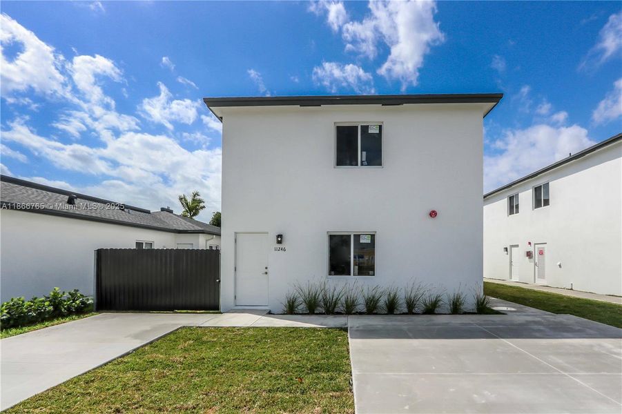 Front exterior of a new home in , Miami, FL, highlighting curb appeal (Image 18).