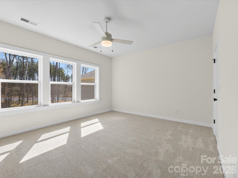 Spacious, unfurnished interior of a new home in North Creek Village, Huntersville (Image 26).