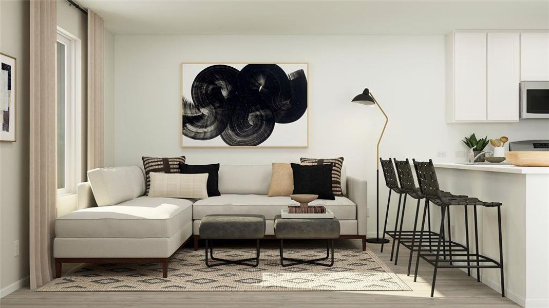 Sitting room featuring light hardwood / wood-style floors