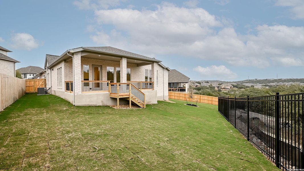 Exterior details and patio area of a home in Johnson Ranch 55', Bulverde (Image 4).