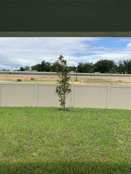 Front exterior of a new home in Sunset Hills, Summerfield, FL, highlighting curb appeal (Image 20).
