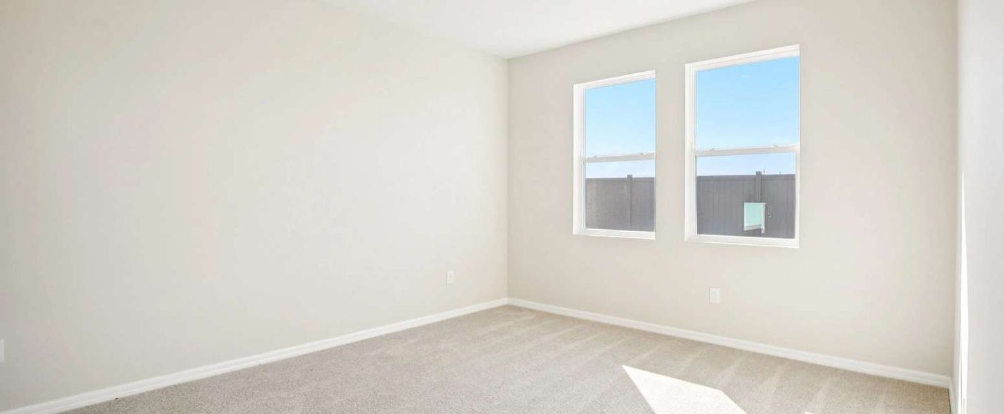 Primary bedroom with double windows this room will feature a tray ceiling - Representative images and renderings are for illustrative purposes Primary bedroom with double windows this room will feature a tray ceiling - Representative images and renderings are for illustrative purposes