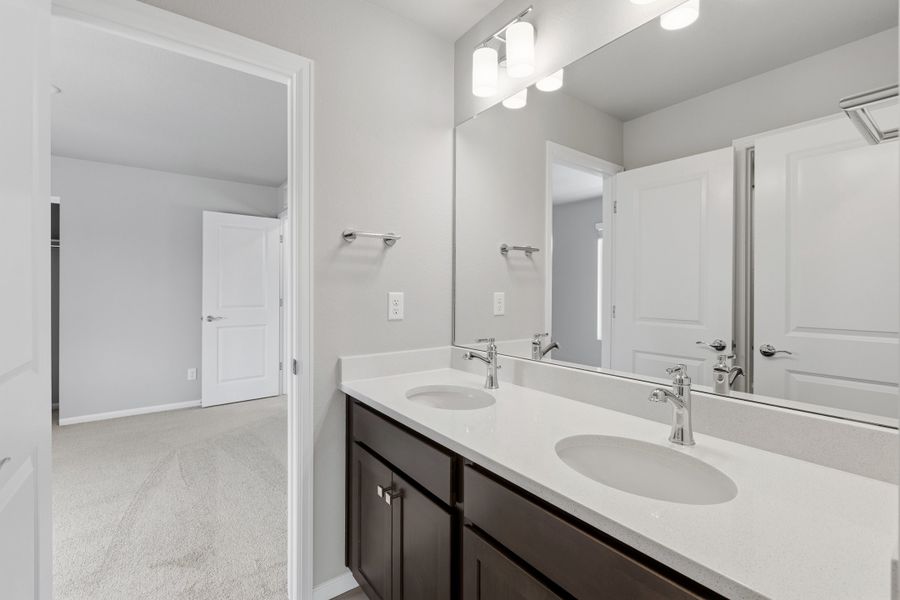 Furnished interior view inside a new home in Woodrose at Painted Prairie, Aurora (Image 8).