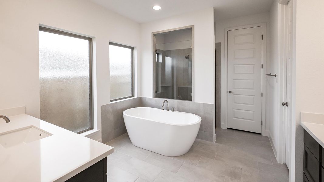 Furnished interior view inside a new home in Crosswinds, Kyle (Image 9).