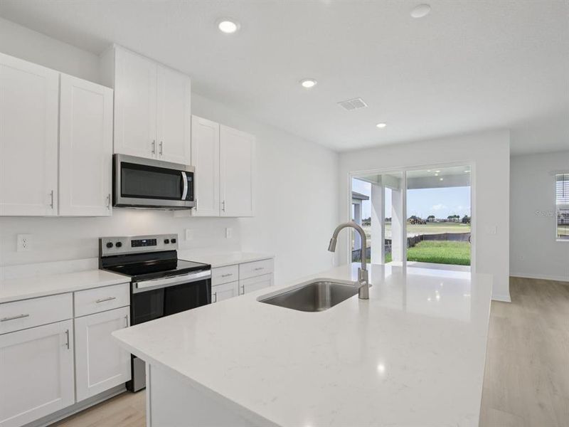 Furnished interior view inside a new home in Coasterra - Reserve Series, Palmetto (Image 12).